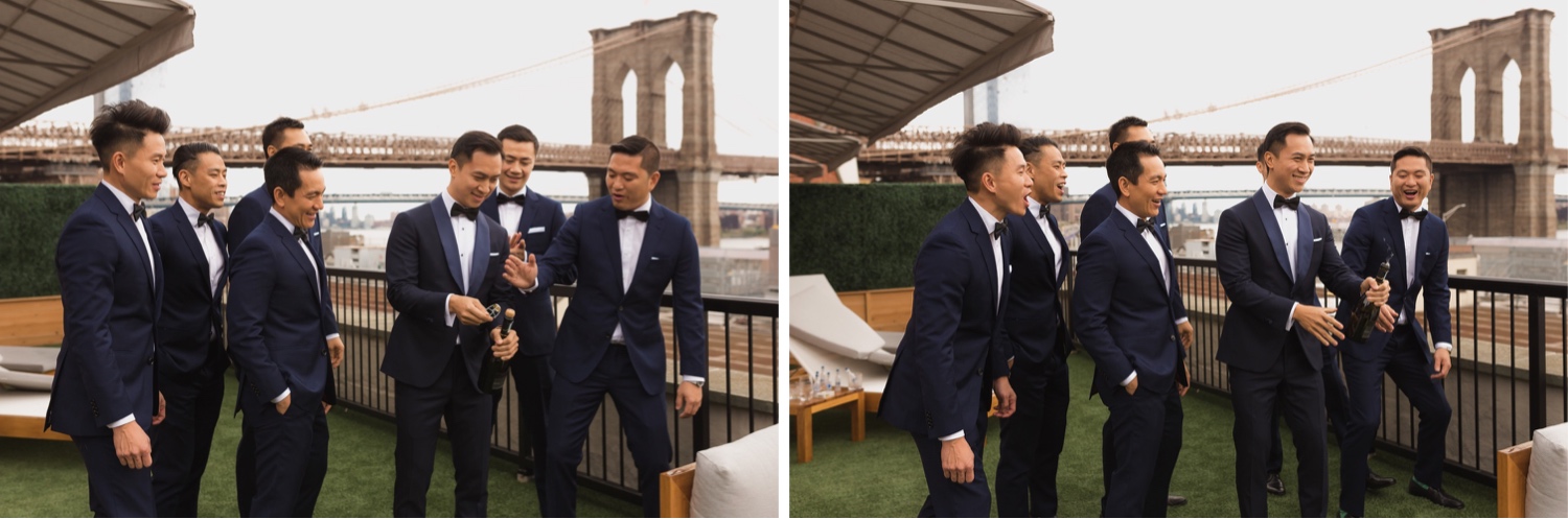 A groom opening a bottle of champagne as a celebration in Mr. C seaport hotel on a wedding day at Cipriani Wall Street in New York City. 