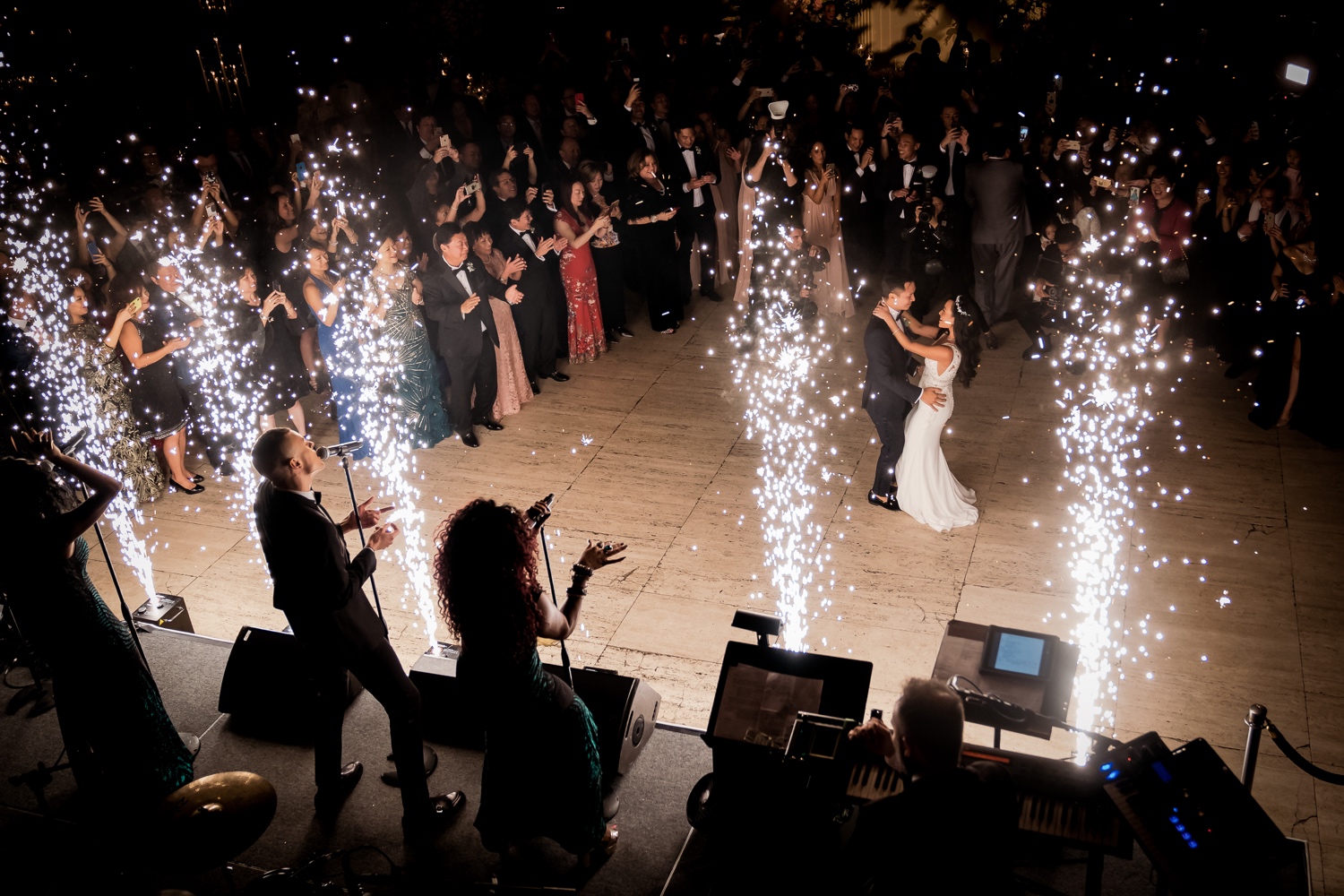 A first dance as a husband and wife during a wedding reception at Cipriani Wall Street in New York City. Wedding Dress by Pronovias