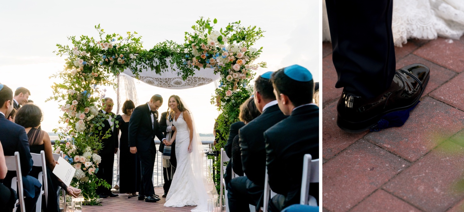 A groom stepping and breaking a glass during a jewish wedding ceremony at Liberty Warehouse, Brooklyn New York.