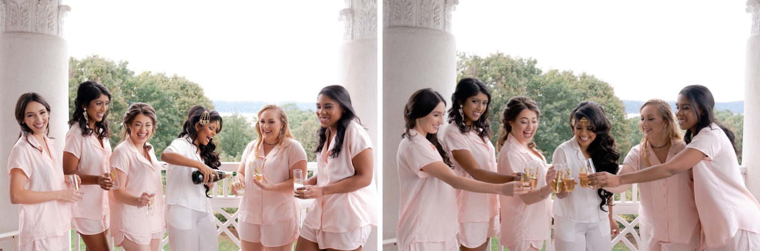 A bride pouring a champagne to her bridesmaids at .the Tappan Hill Mansion 