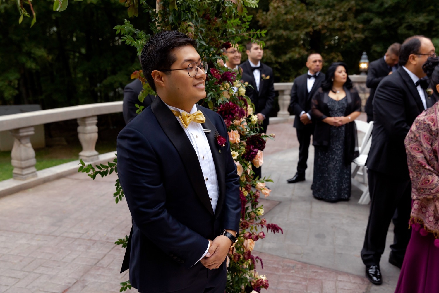 A groom seeing his bride coming for a wedding ceremony at the Tappan Hill Mansion.