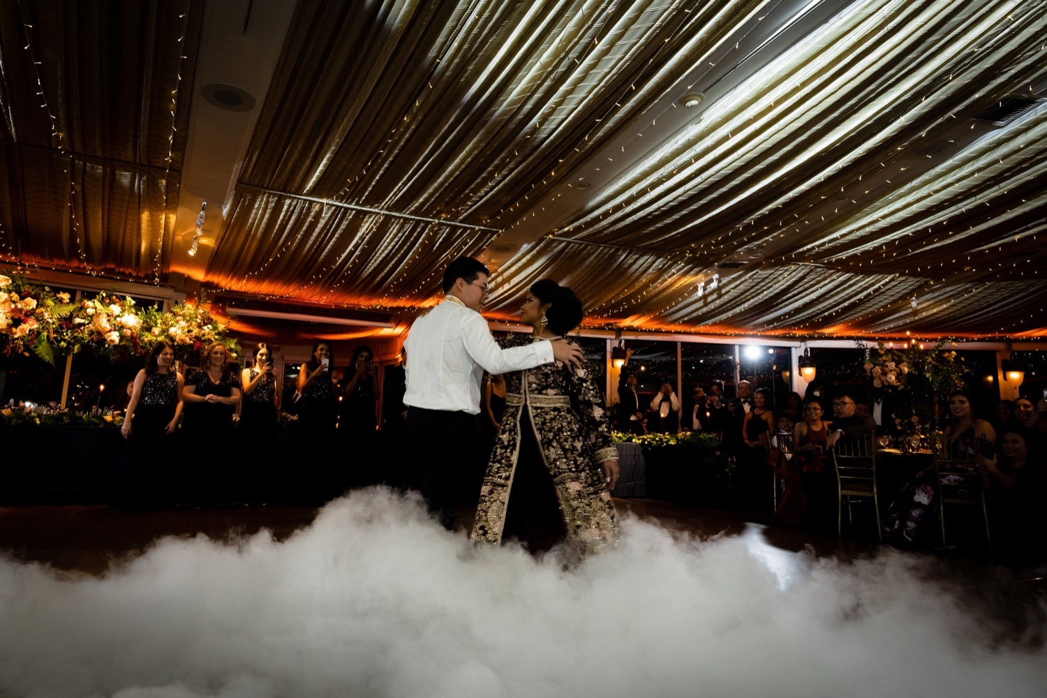 A newly wedded couple's first dance during a wedding reception at the Tappan Hill Mansion. 