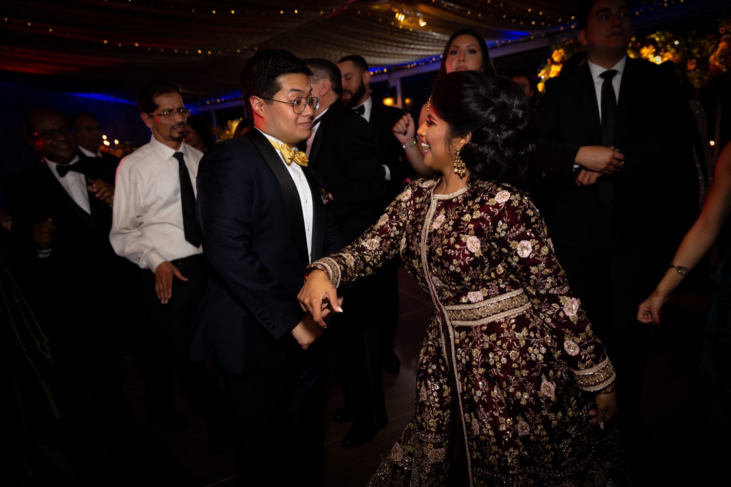 A newly wedded couple dancing during their wedding reception at the Tappan Hill Mansion.