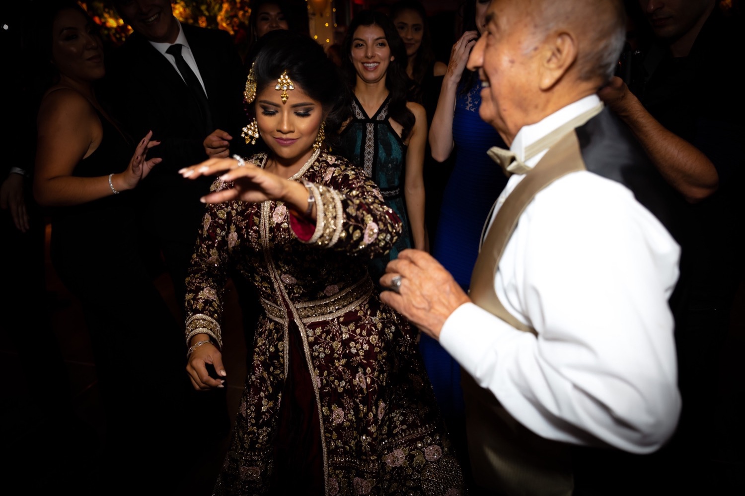 A bride dancing with a significant other during a reception at the Tappan Hill Mansion. 