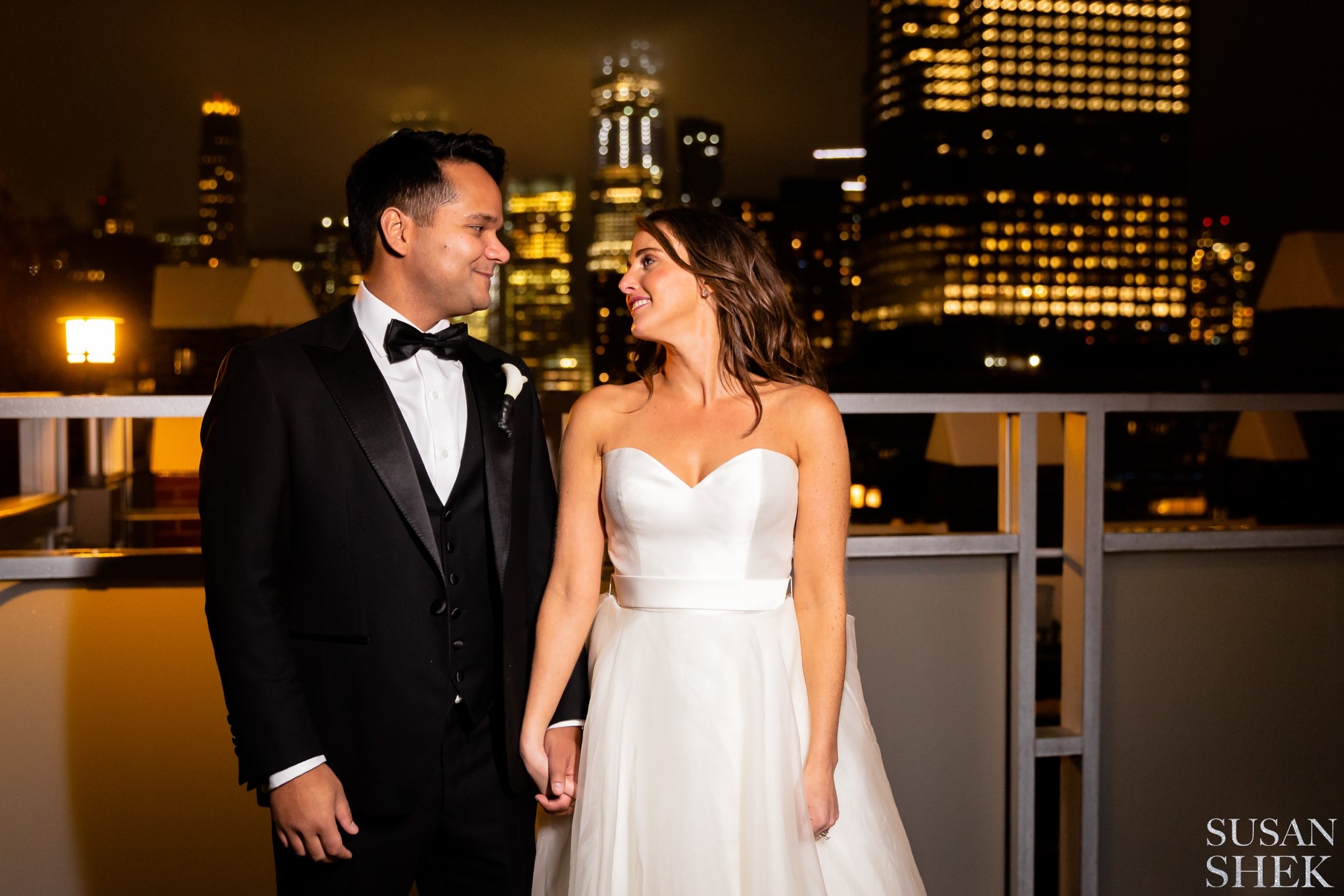 bride and groom portraits at night in tribeca rooftop