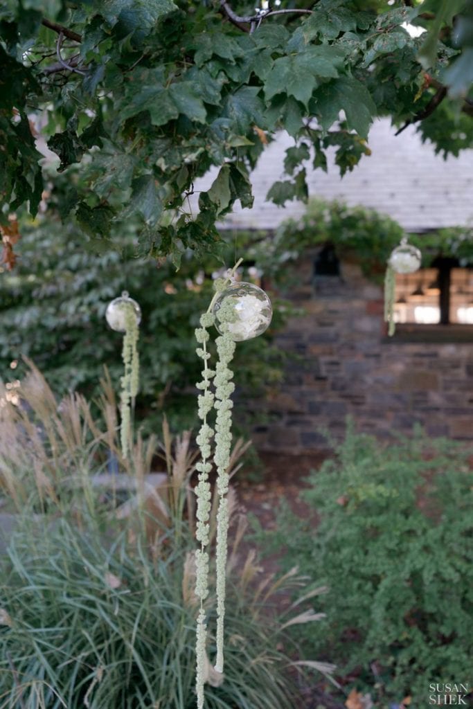 flower decor for the wedding ceremony at blue hill stone barns