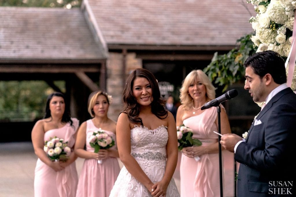 bride smiling at blue hill stone barns wedding ceremony