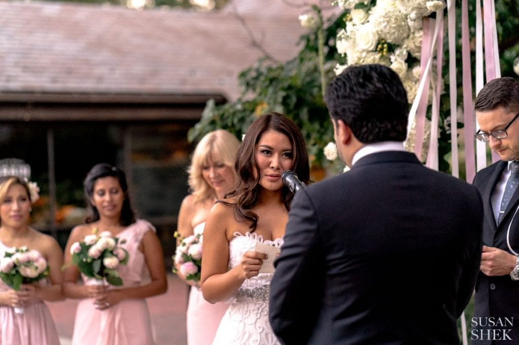 bride reading her vows at blue hill stone barns