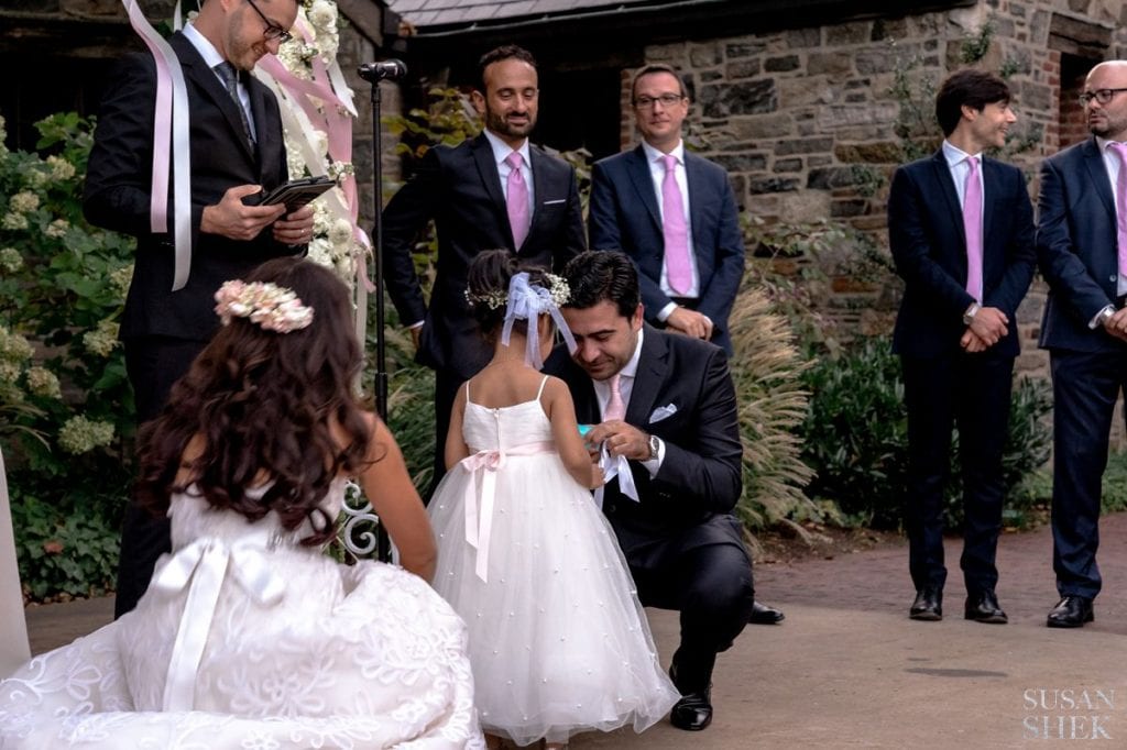 flower girl receiving gift at blue hill stone barns