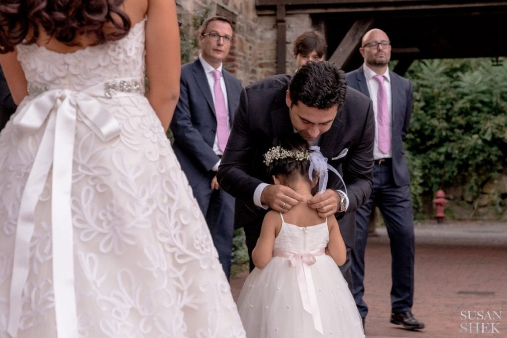 flower girl receiving gift at blue hill stone barns