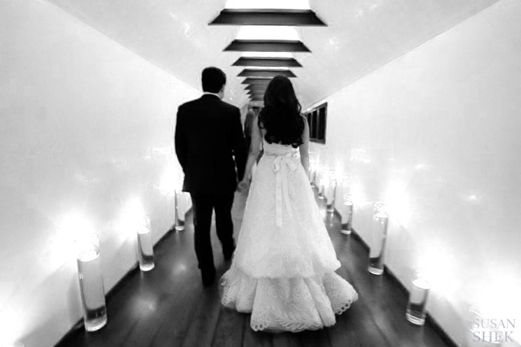 black and white hallway with married couple blue hill stone barns