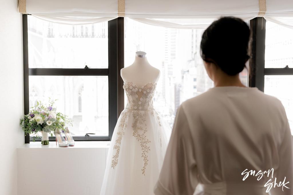 Bride looking at her Galia Lahav Wedding Dress