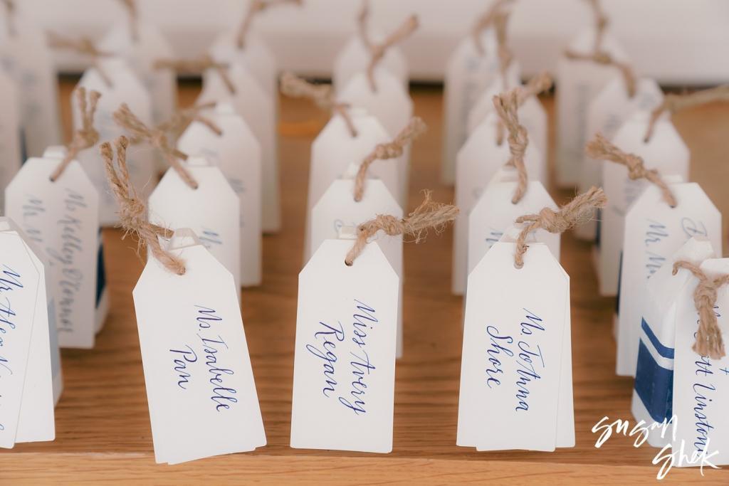 Escort tags tied with twine and written in calligraphy