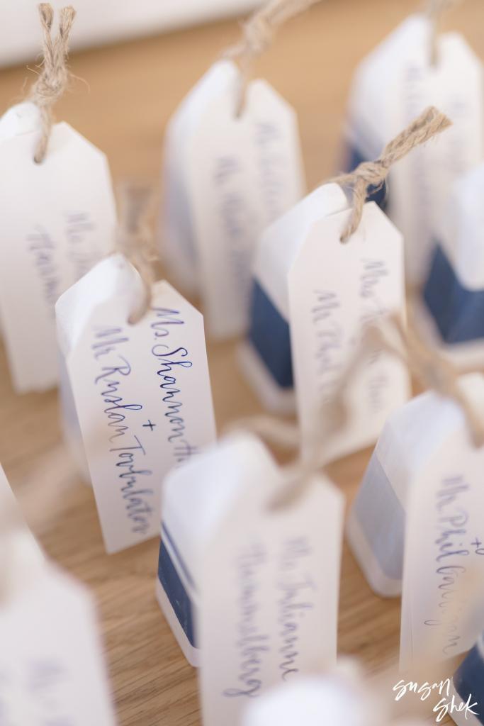 Calligraphy escort tags tied with twine