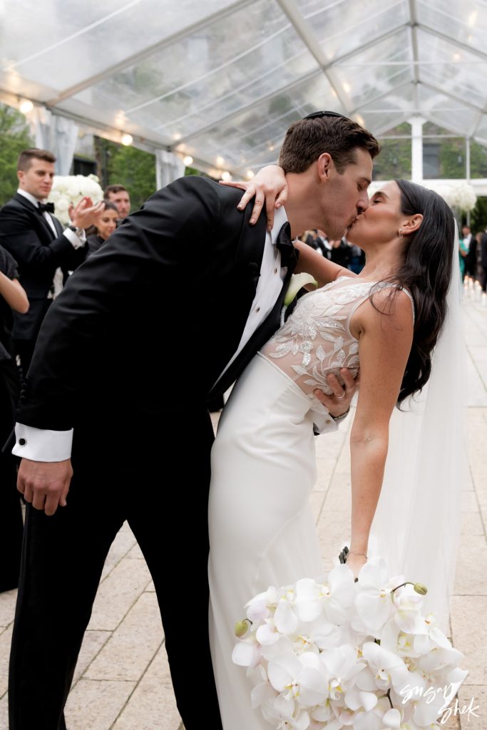 First kiss after ceremony at the foundry