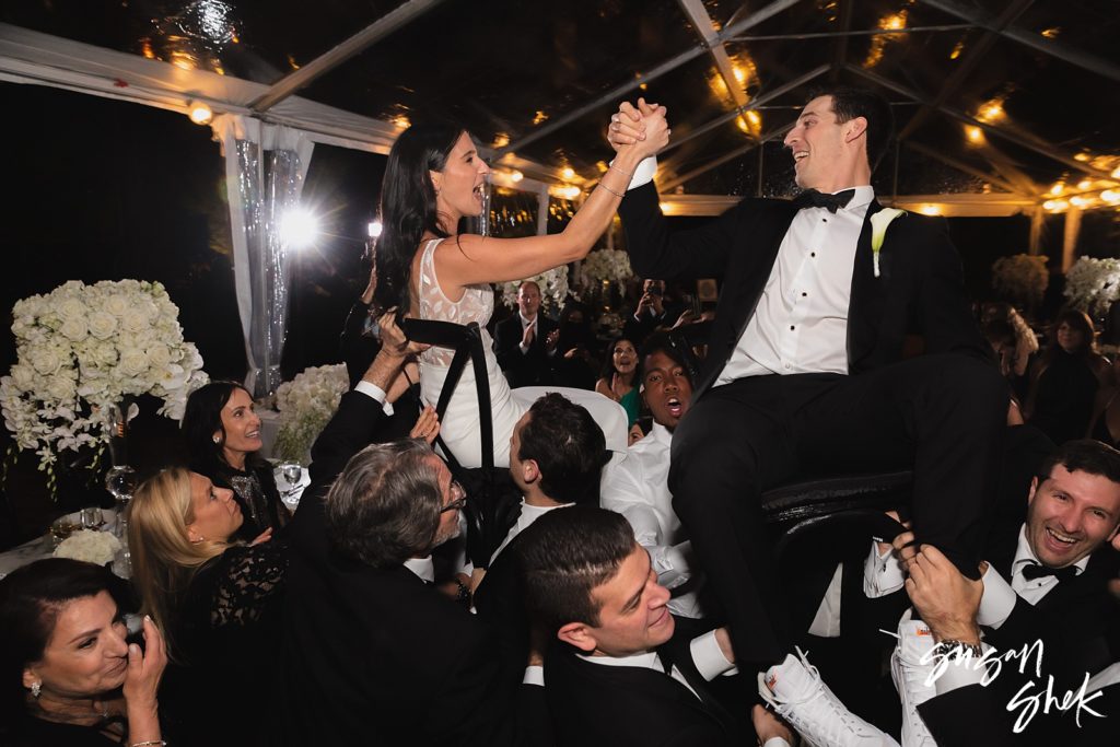 bride dancing the hora with the groom