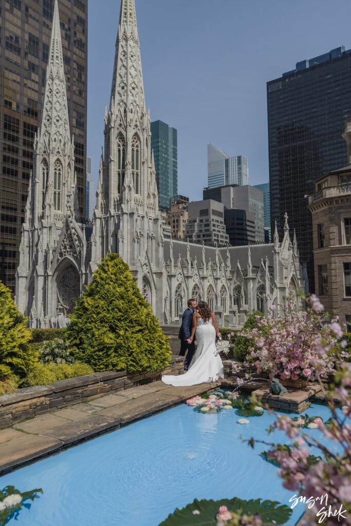 couple kissing in front of st patricks cathedral at 620 loft and garden view