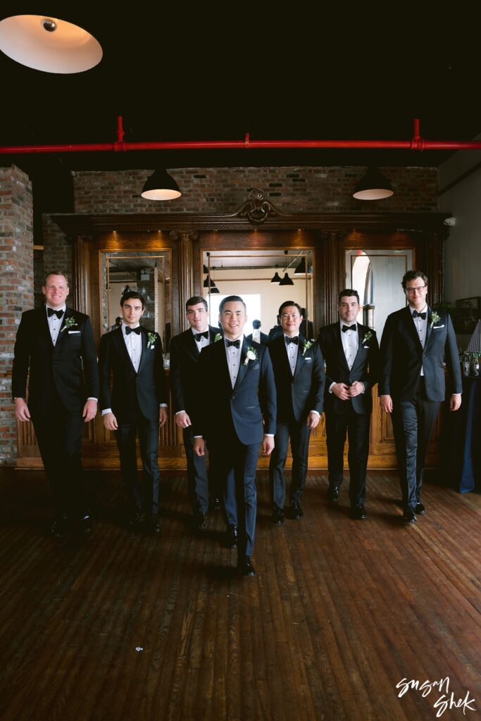 groomsmen at liberty warehouse bar photo