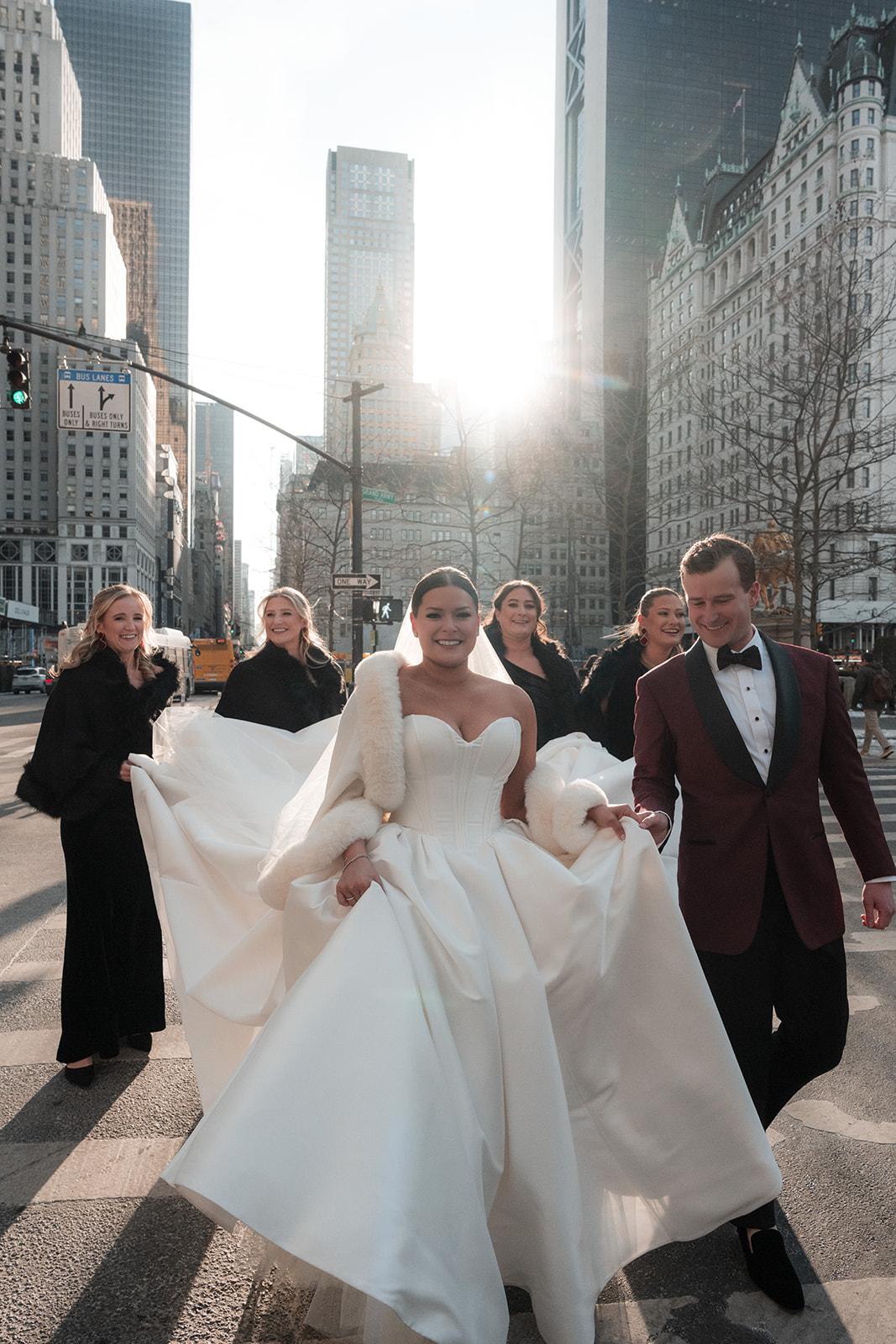 Couple embracing outside the Metropolitan Club in New York City during winter
