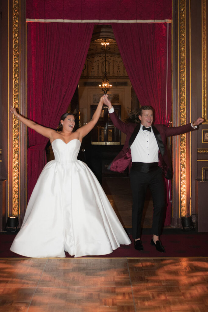 Bride and Groom entering their reception at a New York City wedding