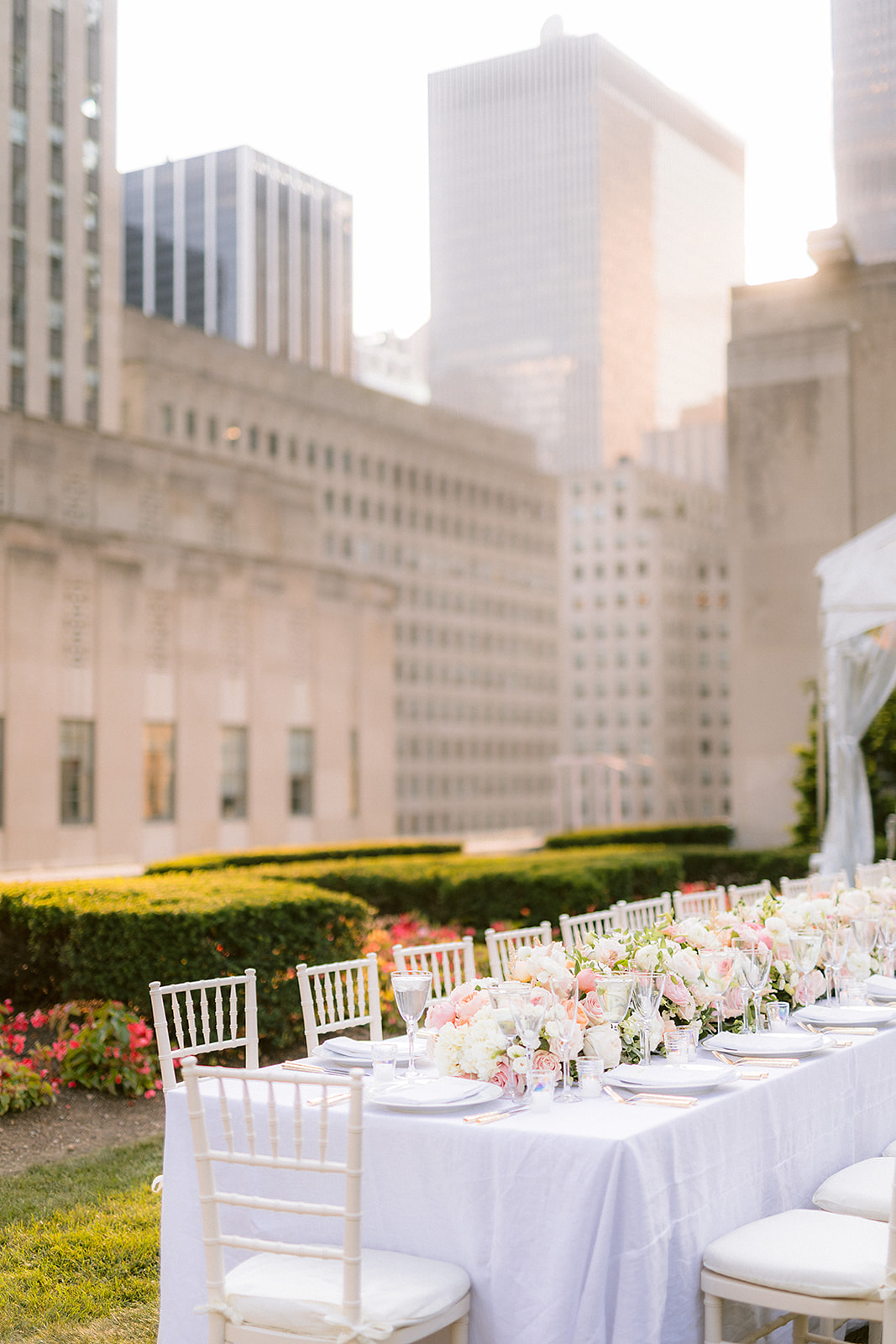 Elegant rooftop dinner table at 620 Loft and Garden with St. Patrick’s Cathedral view