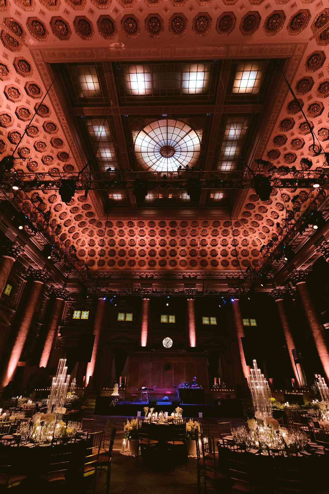 Aerial shot of a lively dance floor surrounded by candlelit tables inside the Capitale NYC wedding venue.