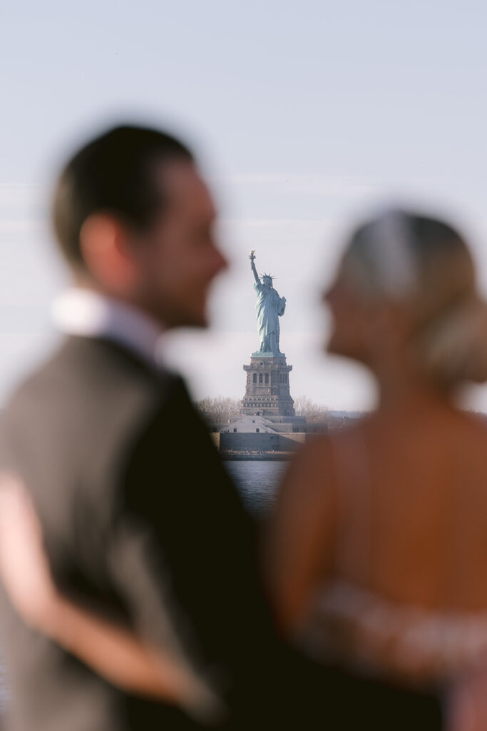Romantic New York City wedding portraits overlooking the harbor